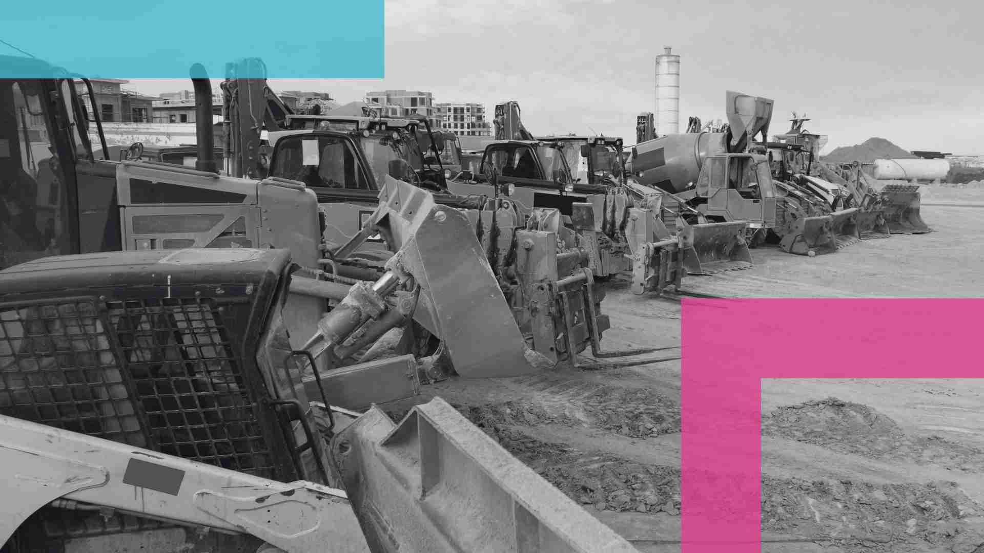 Multiple heavy machines parked up on a worksite