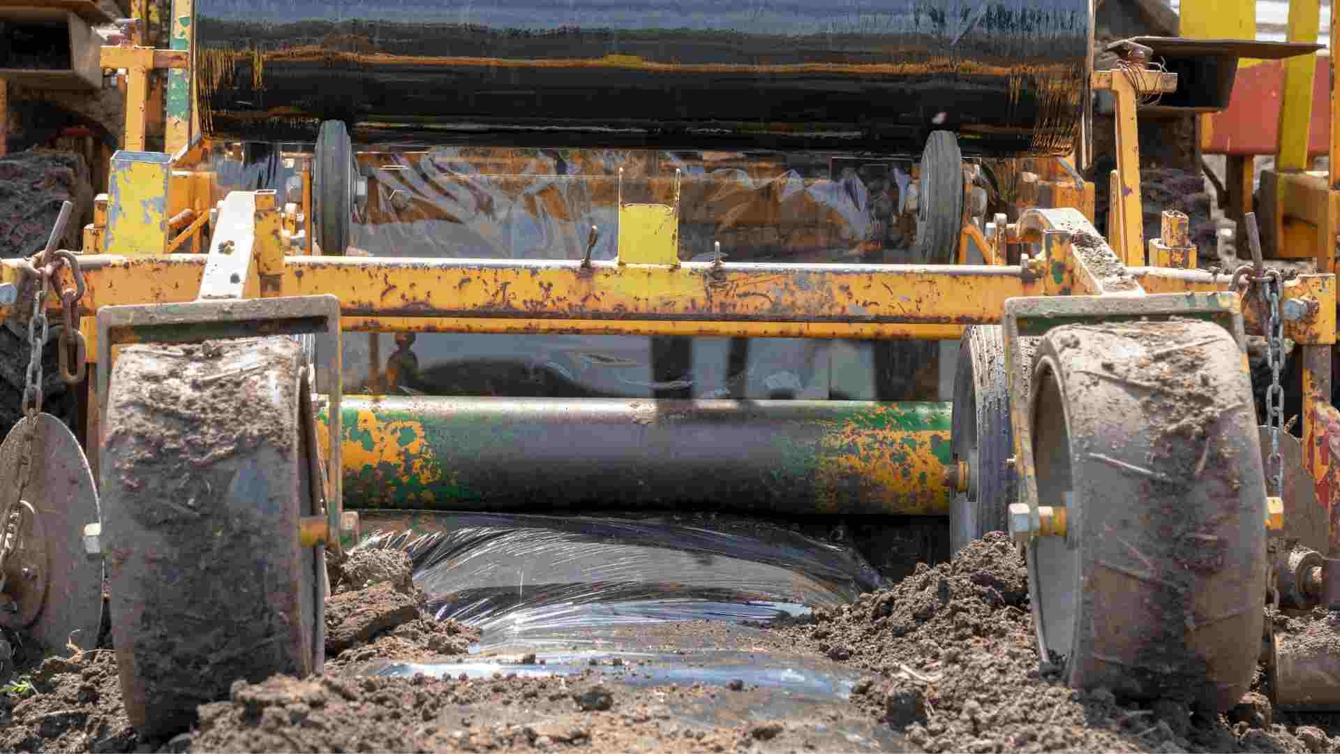 Close up of a plastic mulch retriever