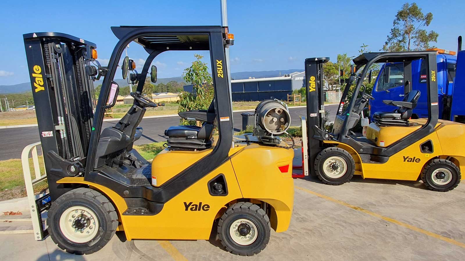 Yellow forklift at a dealership 