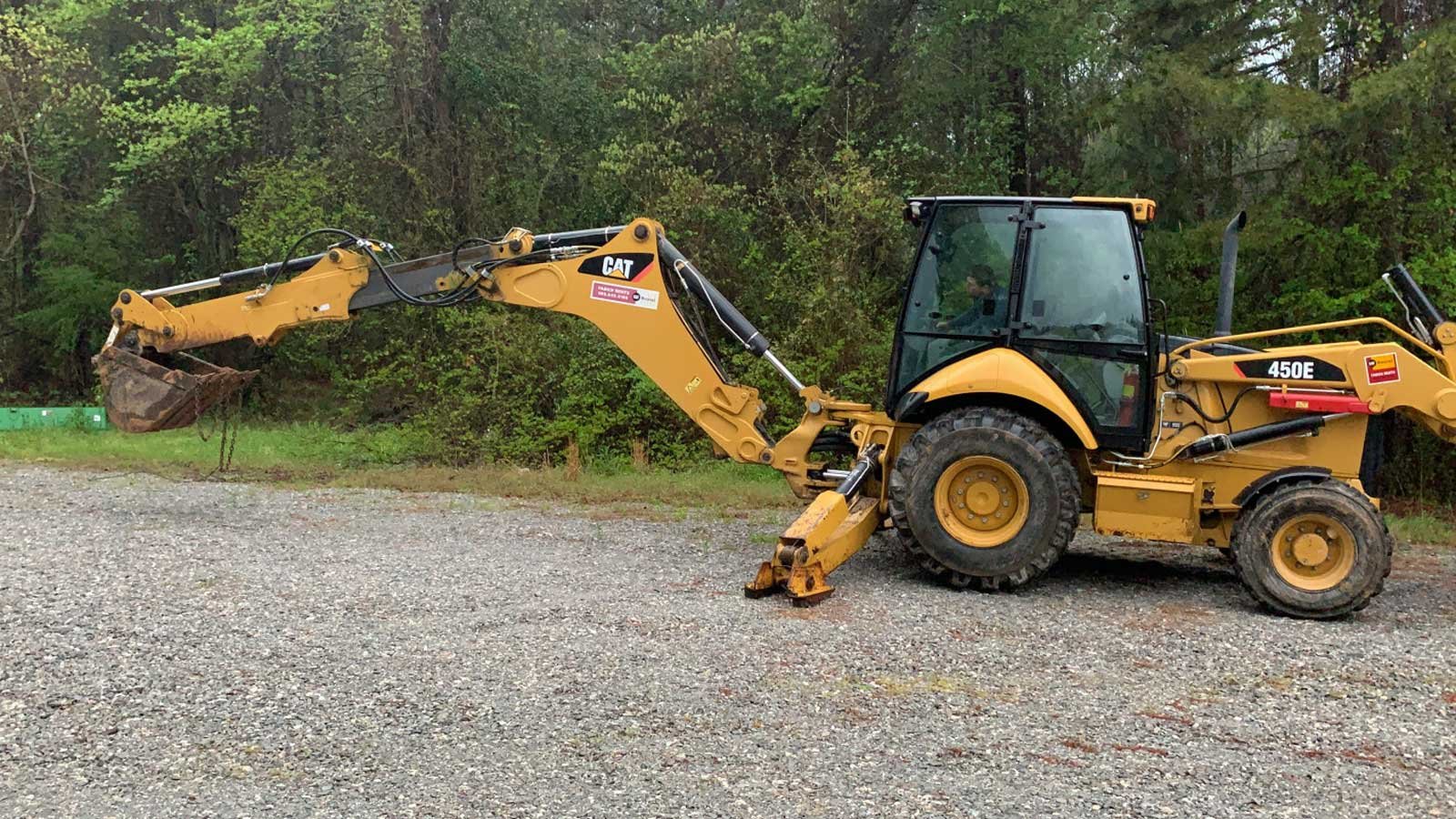 Safety props on a loader machine