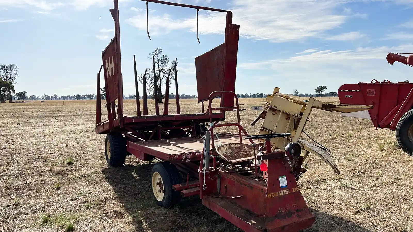 Self-propelled hay bale loader in a clearing sale