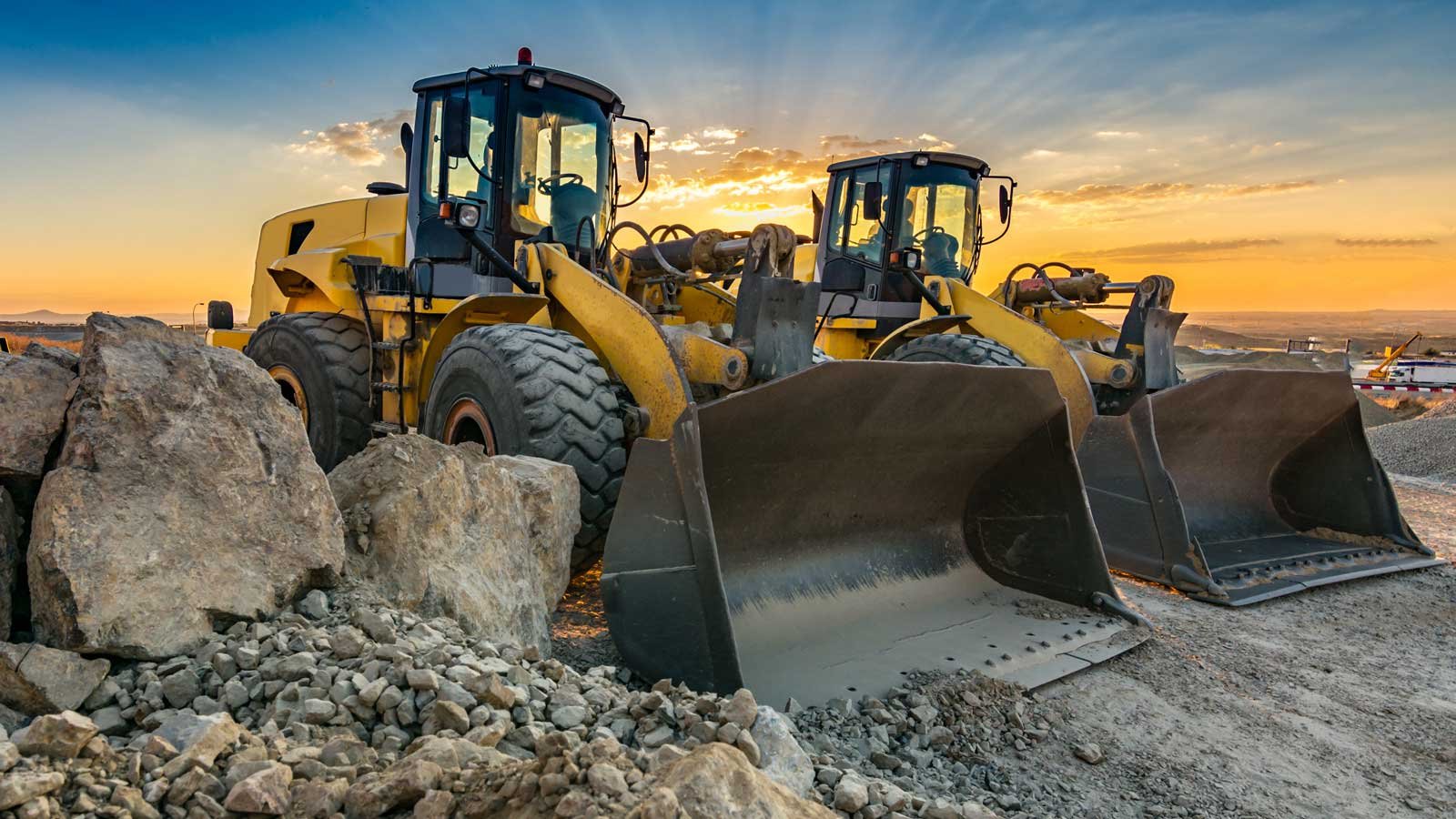 Two front loaders on a work site