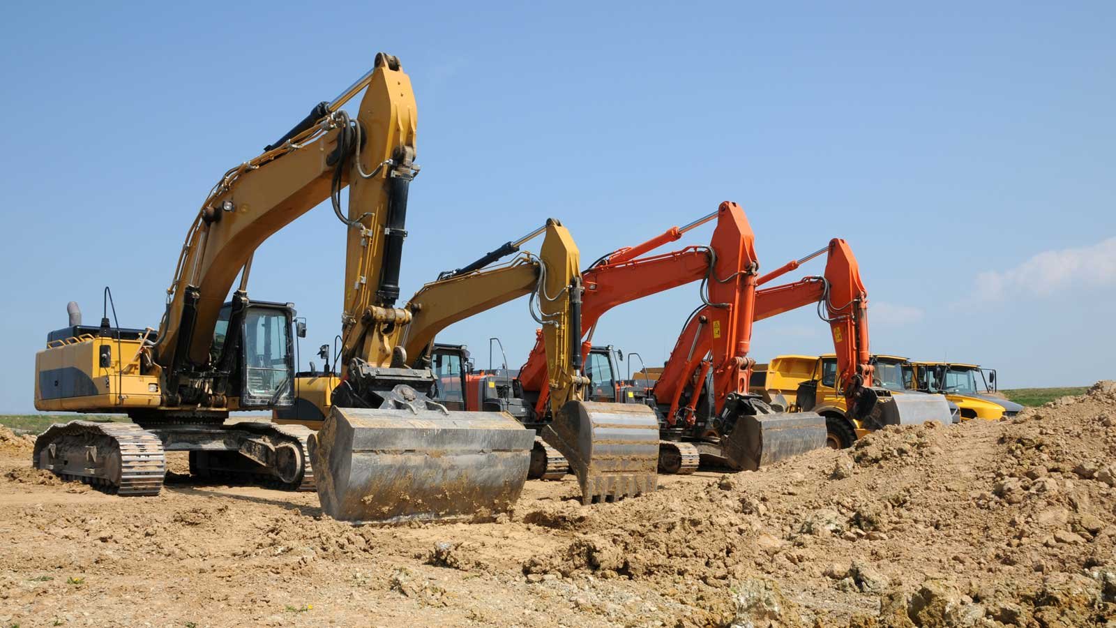 Lineup on excavators on a work site