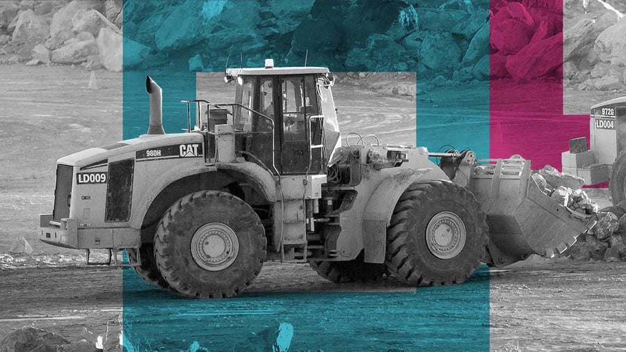 Cat front loader machine moving dirt