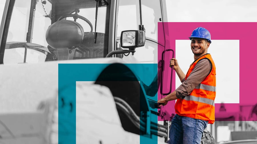 Man in hi-vis getting into machine
