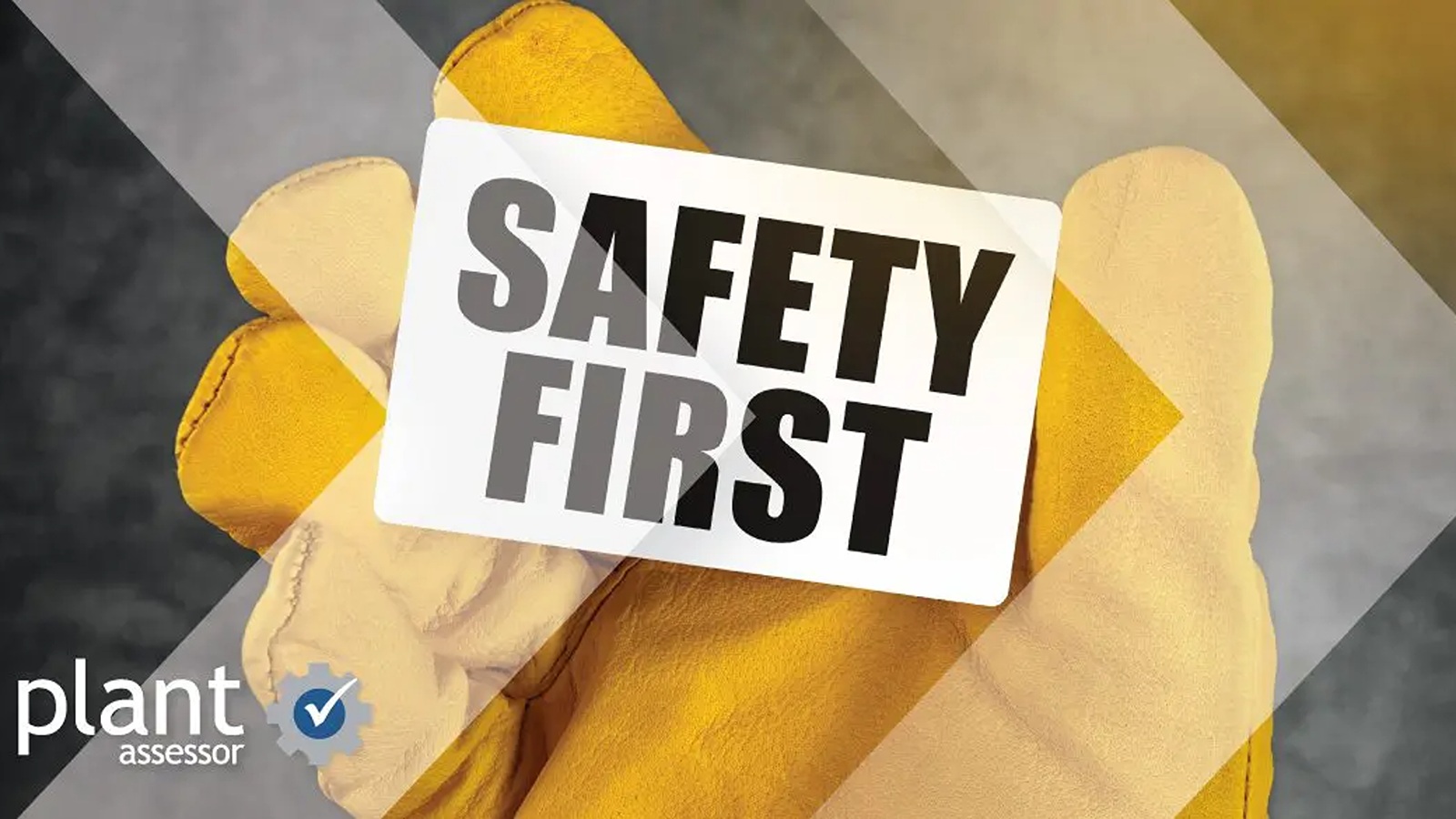 hand in yellow glove holding black and white safety first sign