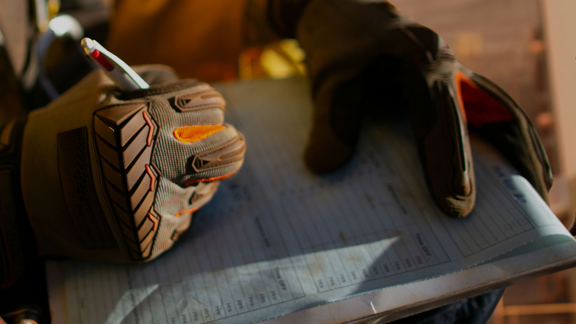 close up of a-persons hands writing paper risk assessment