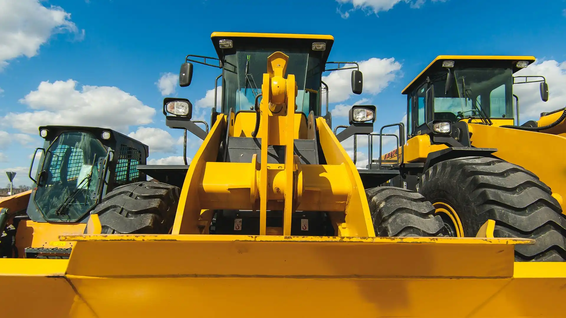 Close up of yellow heavy machinery